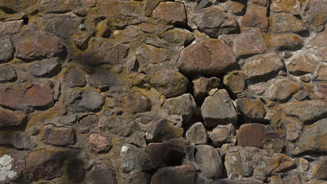 a close-up view of an ancient and gorgeous stone wall of museum fortress korela, russia