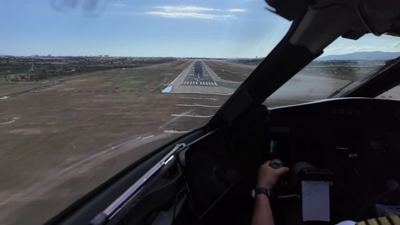 An immersice pilot’s view FPV from inside a jet cockpit in a real time landing with crosswind and turbulence at Palma’s airport. Daylight.