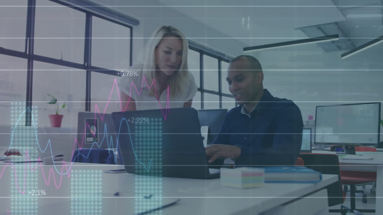 Animated data processing discussion between diverse colleagues at office.