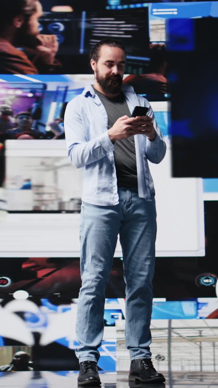 Vertical Video High tech lifestyle of a young guy scrolling through real time notifications