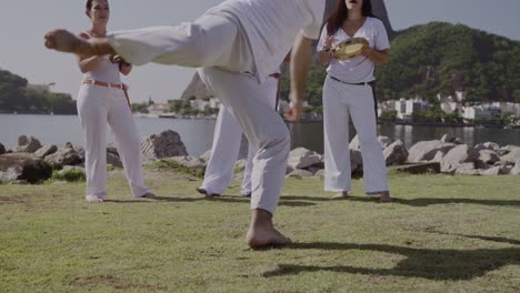 group practicing capoeira outdoors in rio de janeiro