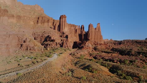 road through moab utah red rocks and cliffs 4k