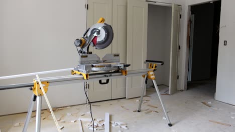 interior construction of housing project with installed construction materials at work using circular saw cutting