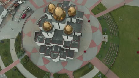 beautiful orthodox church with golden domes from drone aerial view in lviv, ukraine