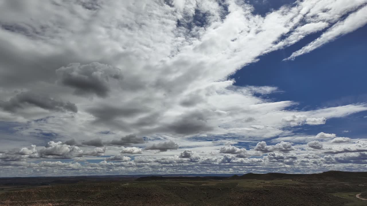 Barred landscape in the Empty Spain. Time lapse with a blue sky with some clouds. 4K