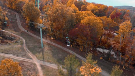 Aerial-Shot-of-Gondola-Going-Up-Mountain