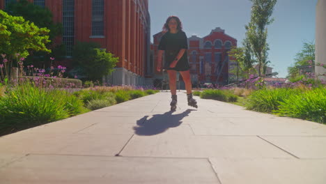 woman rollerblading in urban park