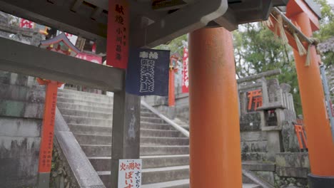 pan establishing shot of fushimi inari taisha, kyoto japan