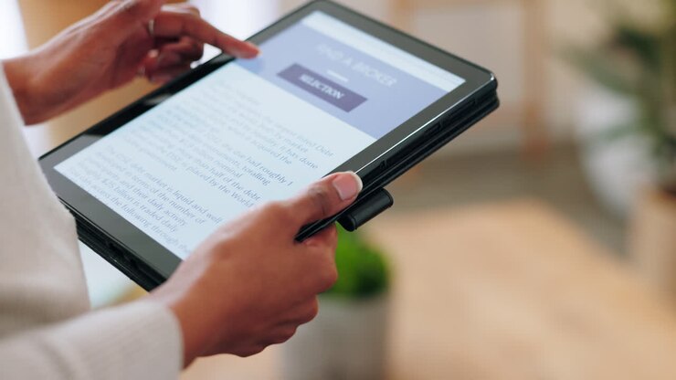 Hands scroll blog on digital tablet