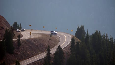 cars driving through the independence pass in colorado