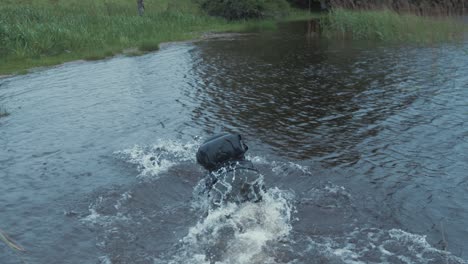 male refugee falls into water crossing river in europe