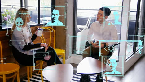 animation of digital interface over diverse two business people