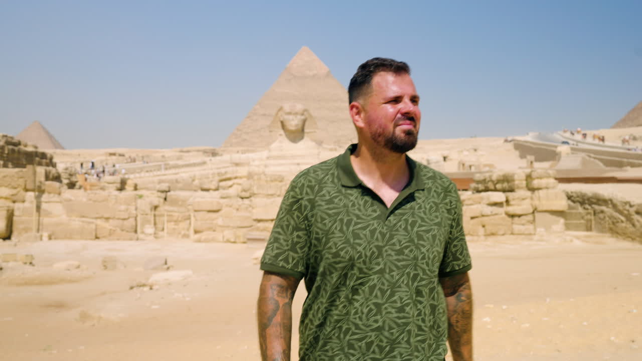 Man Walking Towards Great Sphinx Of Giza In Egypt - Tracking Shot