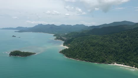 aerial scenic nature drone footage of the mountains and beaches on the tropical island of koh chang in thailand on a sunny day