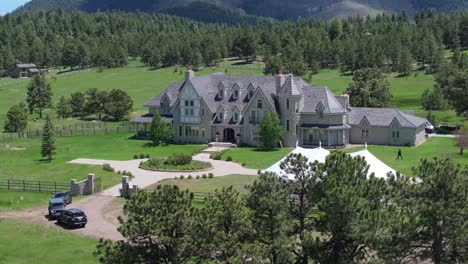 drone crane reveal luxury venue mansion in colorado mountains