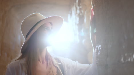 woman exploring a cave