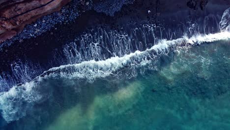 drone rising high from stunning beach view to the sky, tenerife, spain