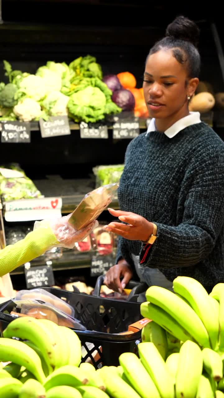 People Shopping for Fresh Produce in a Supermarket
