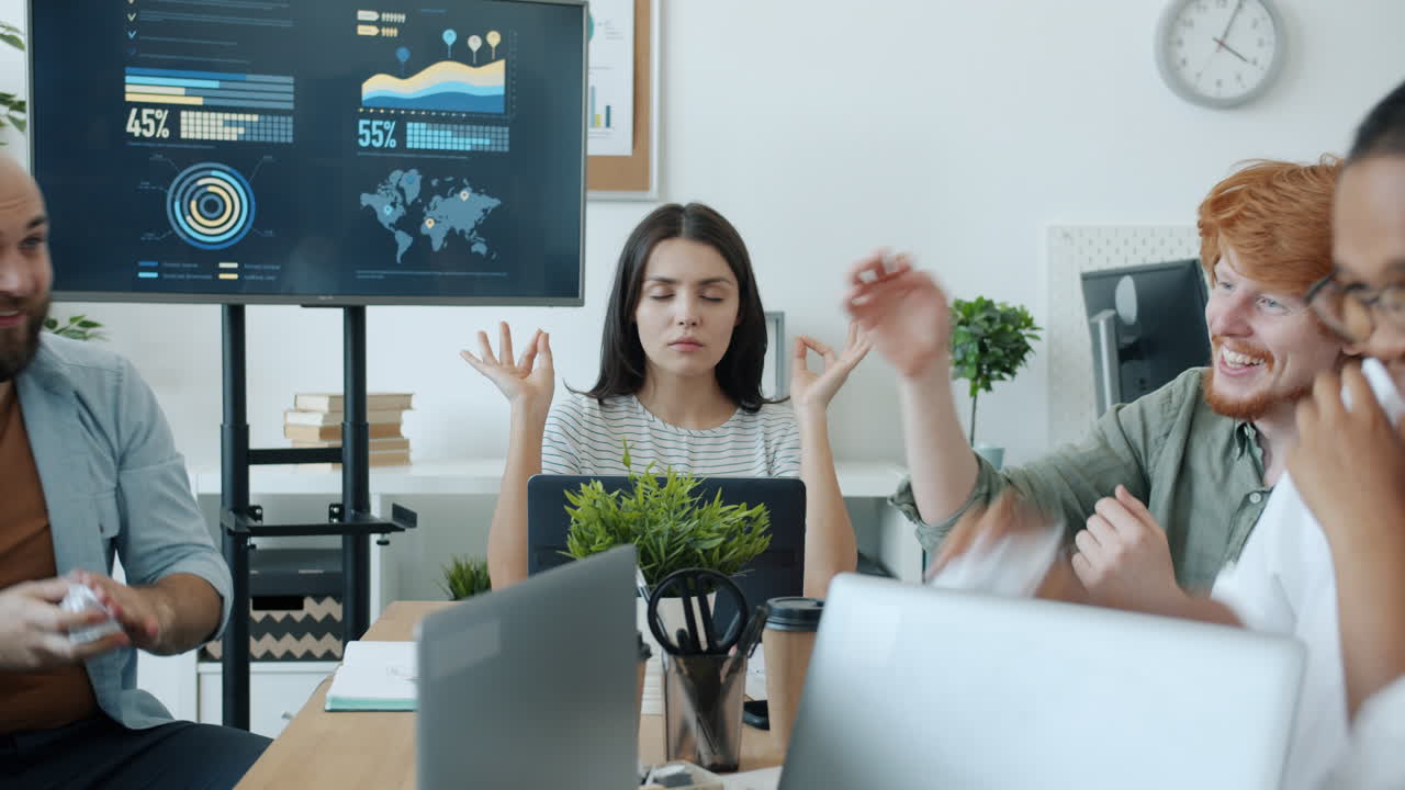 Teammates' lighthearted office meeting