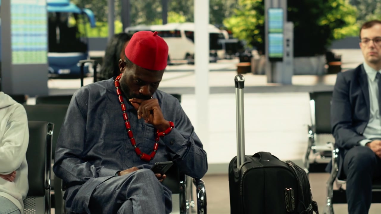Diverse passengers in crowded bus station for long-distance interstate journey