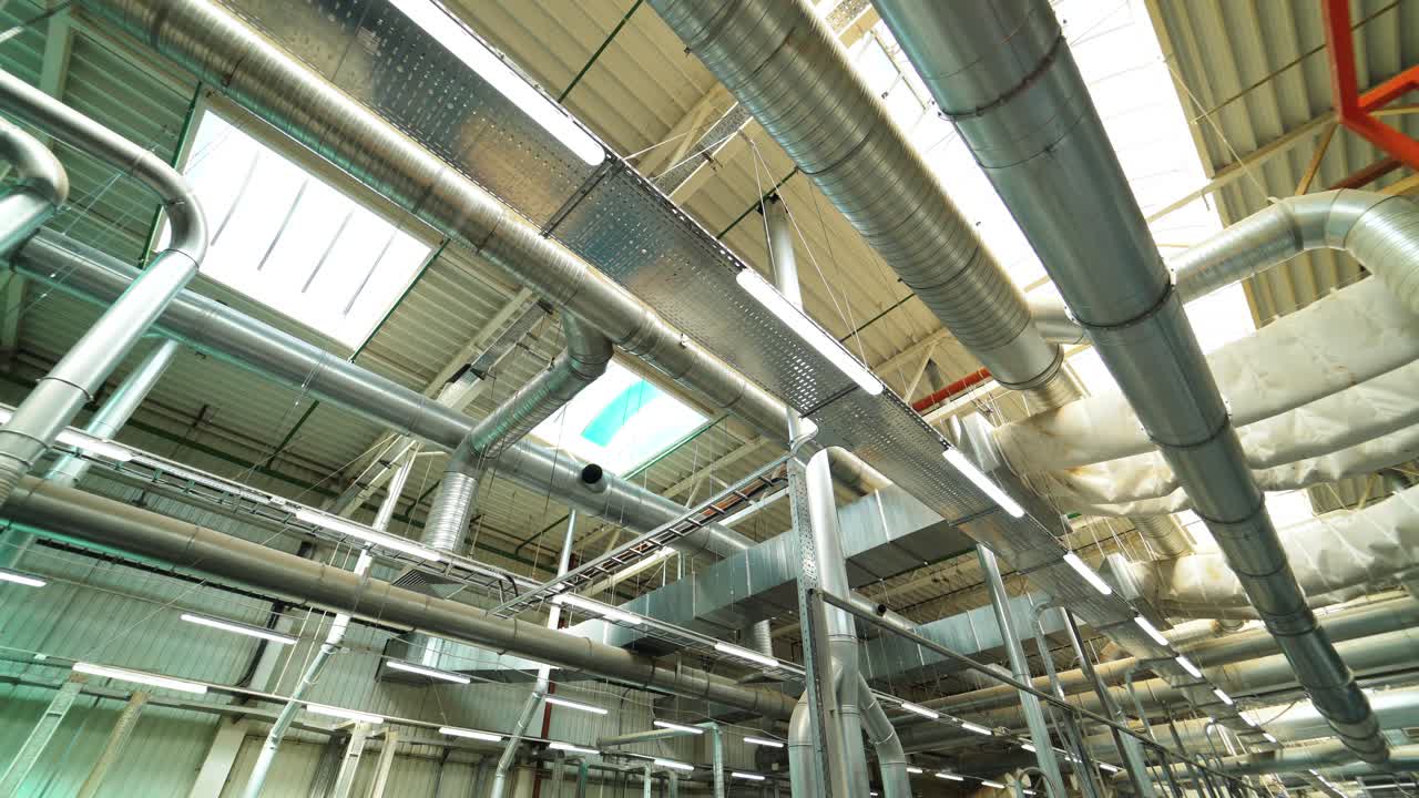 View of the ventilation system of the parquet factory. Camera motion to forward