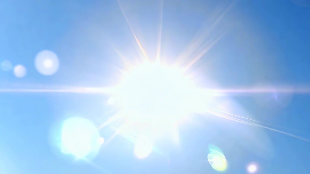 Bright Sun Shining in a Clear Blue Sky