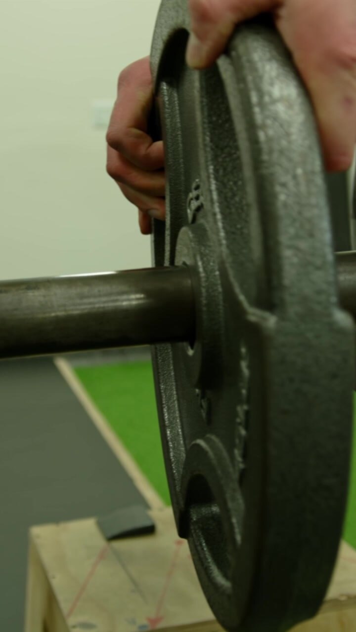 Muscular bodybuilder handsome men doing exercises in gym