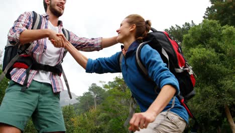 man helping a woman