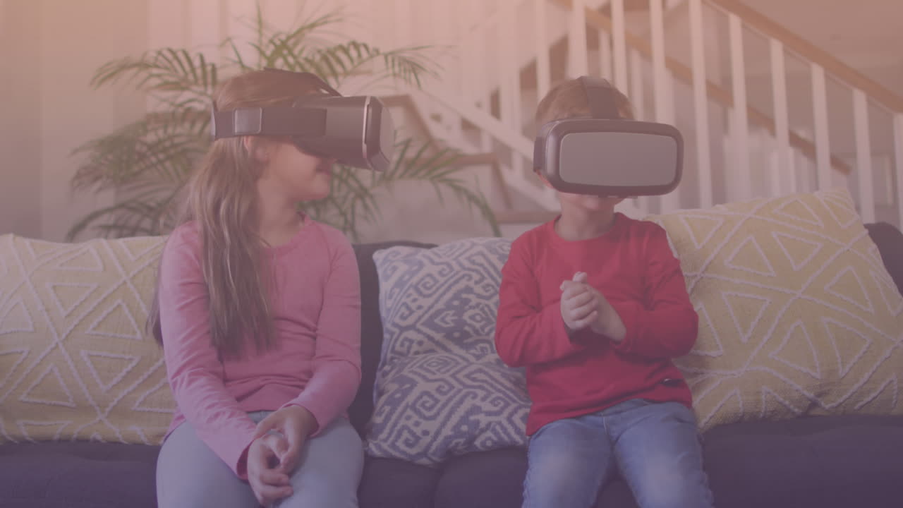 집에서 vr 헤드 ⁇ 을 착용하는 백인 형제 자매에 대한 빛의 반점