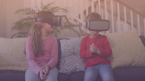 puntos de luz contra el hermano y la hermana caucásicos que usan auriculares vr en casa