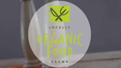 Locally grown organic food animation over blurred kitchen background