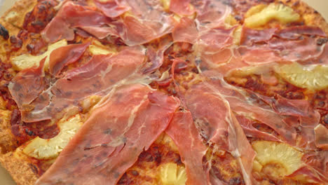 pizza with prosciutto or parma ham pizza - italian food style