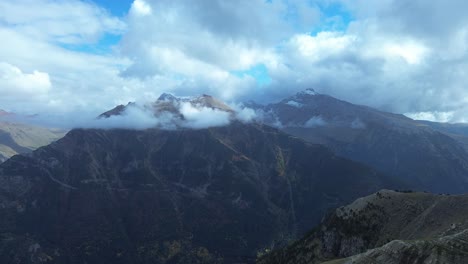 majestic view of collarada and la moleta mountains under scattered clouds in aragón spain