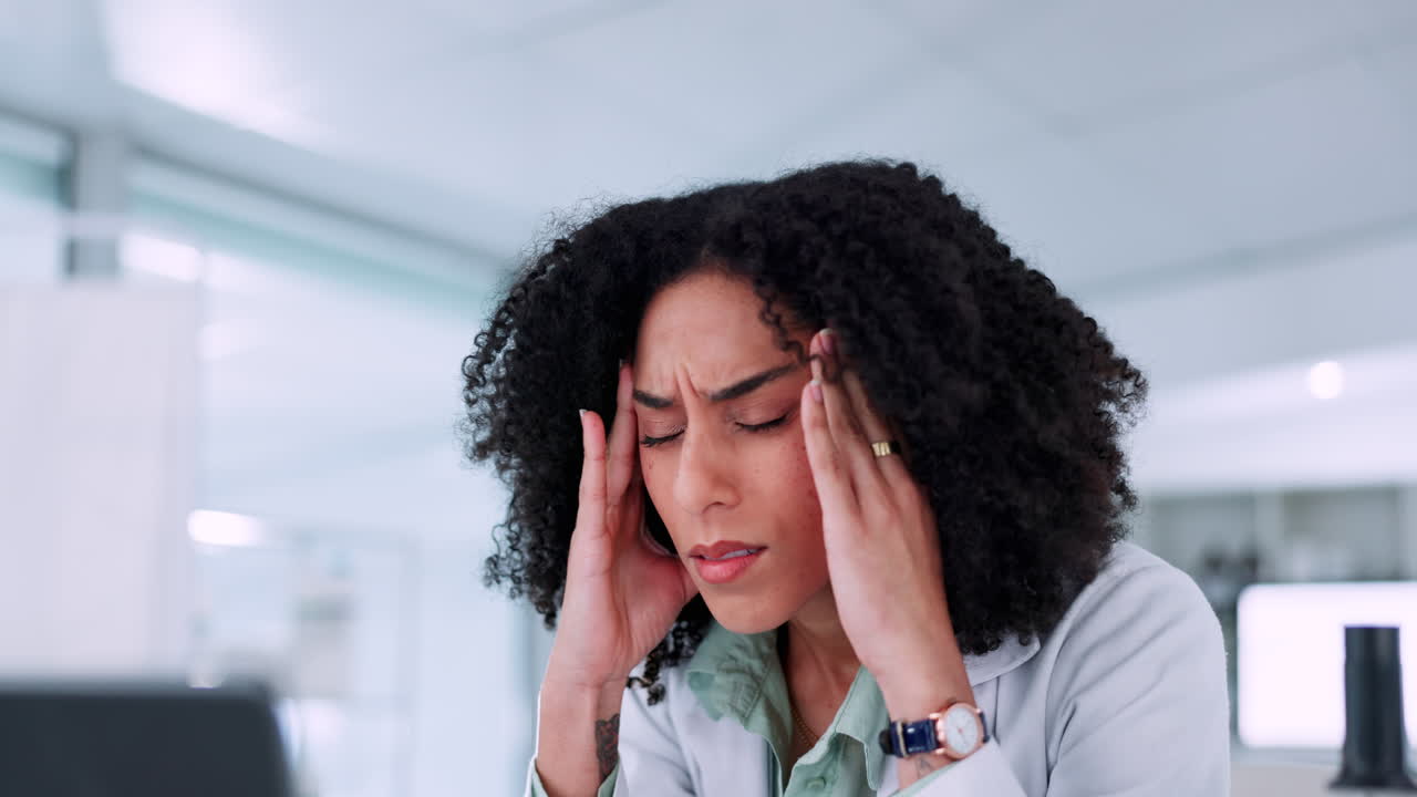 Scientist, stress and headache on computer