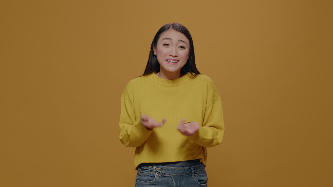 POV of person waving at camera and talking on video call