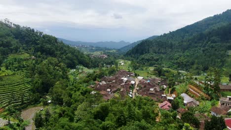 picturesque village sutopati located in valley between hills on java aerial view