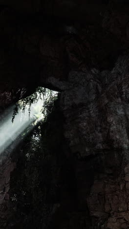 sunlight streaming through a cave opening