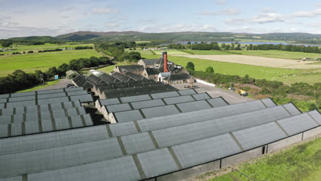 Whisky-Distillery-Aerial-Balblair-along-the-warehouses