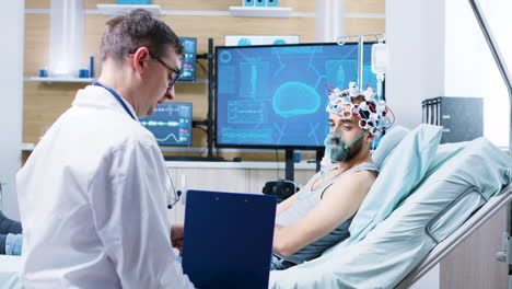 patient in a neurology centre wearing brainwaves scanning headset