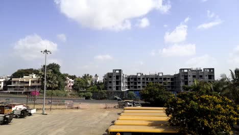 mazing-cloudy-day-timelapse,-Relaxing-clouds-pass-by-blue-summer-sky-with-clouds,-Busy-road-timelpase,-Mumbai,-India