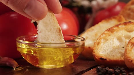delicious tapas bread with tomatoes pasta with olive oil close-up, bruschetta with red sauce ketchup, olives dry tomatoes and tasty sandwich bar appetizer, buffet