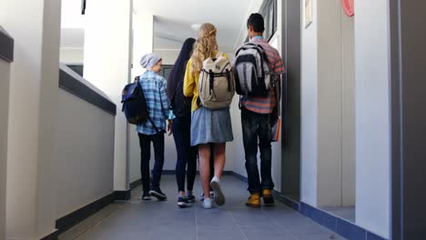 group of classmate walking in corridor