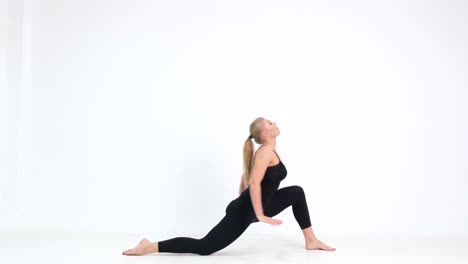 yoga poses in a public park with a young fit woman demonstrating the balance and power needed powerful and mindful this woman demonstrates yoga in a public park