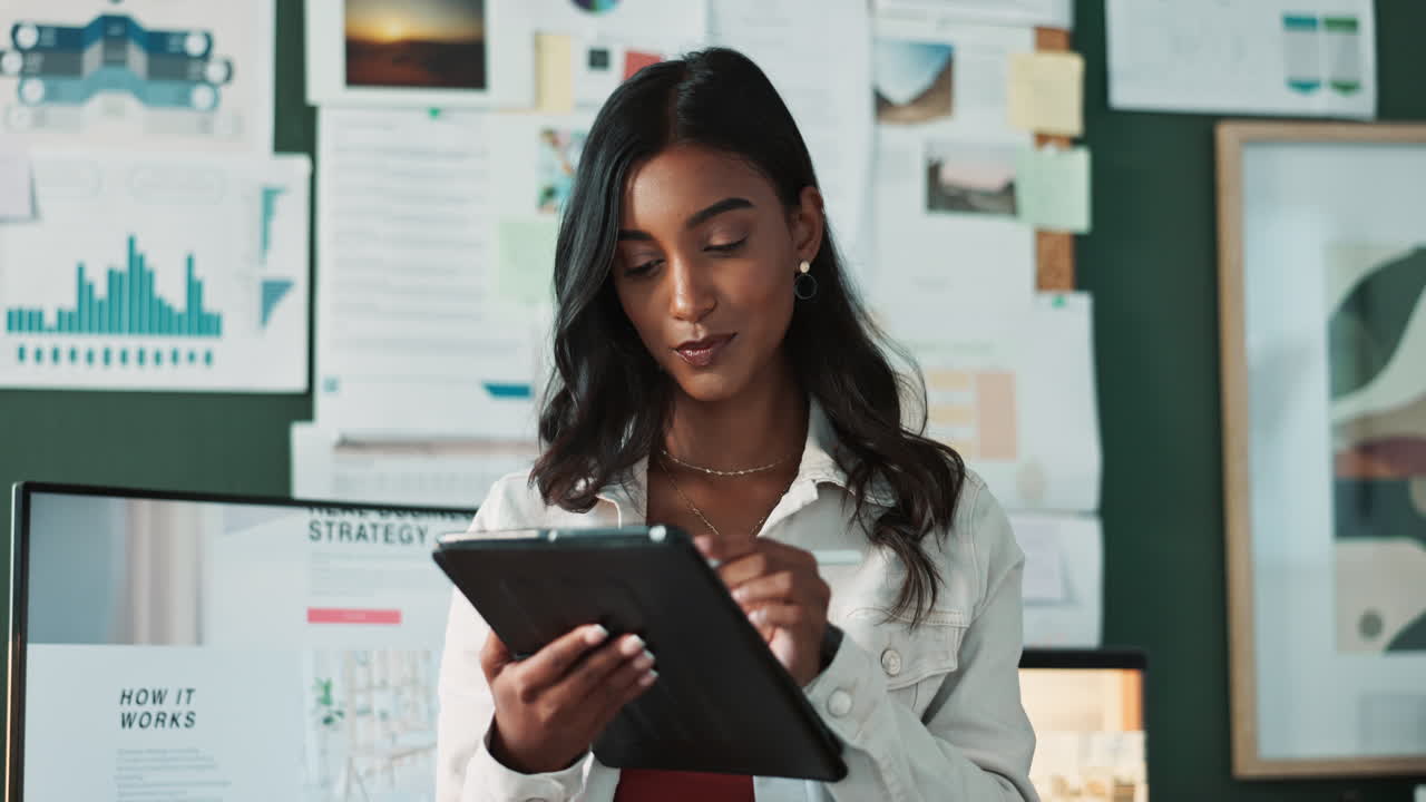 Businesswoman working with a tablet in a modern office environment
