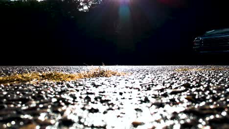 Dark-parking-lot-with-bright-sun-reflection