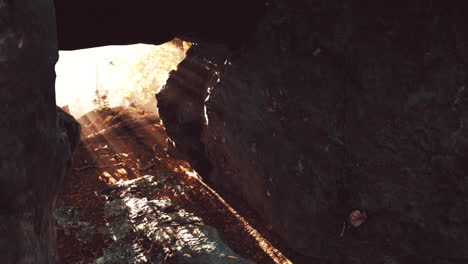 empty road goes through the cave with glowing end