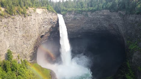 tall and powerful helmcken falls in the beautiful and scenic wells gray provincial park in british columbia, canada