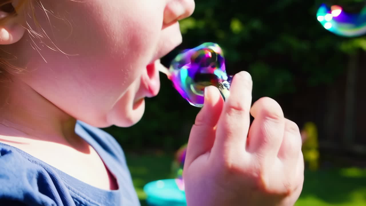Children Playing with Bubbles in the Garden