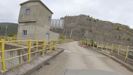 dam-crossing-with-car