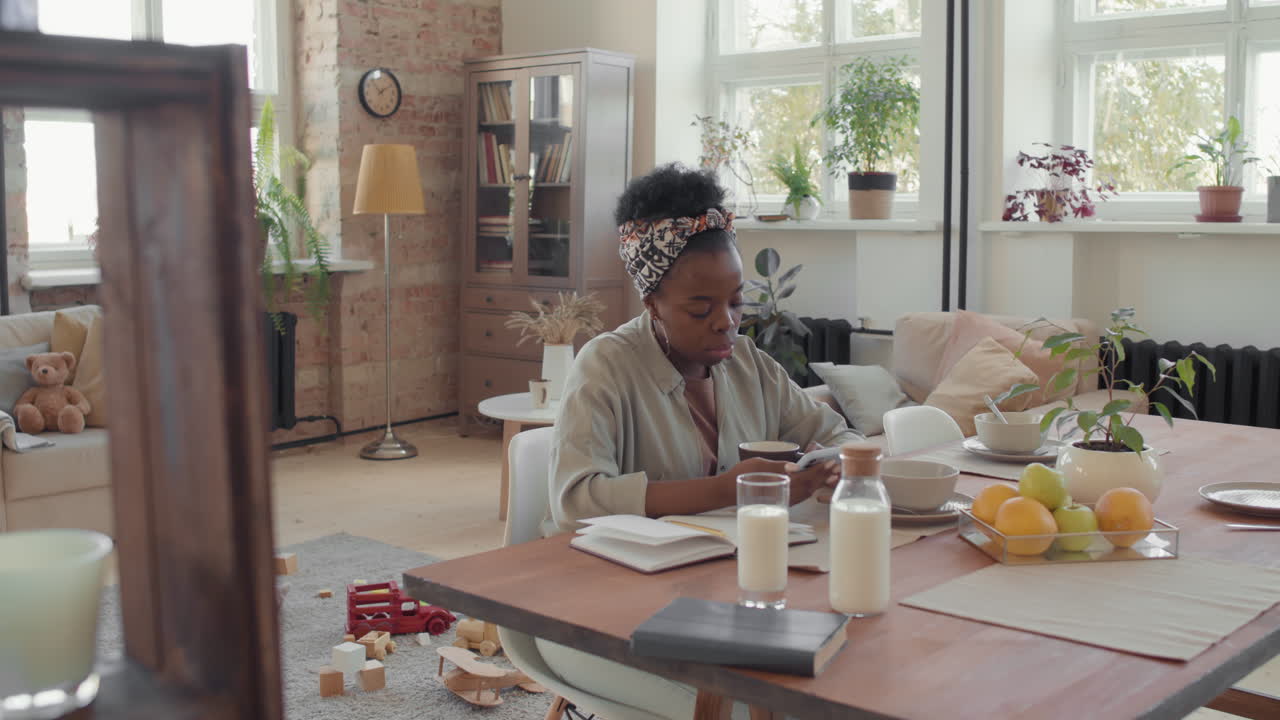 Slowmo of Black Woman Resting in Loft Apartment